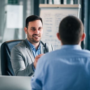 Two men having a conversation about advice pensions