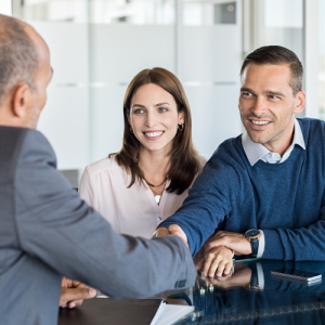  A couple that are discussing their options with an investment specialist